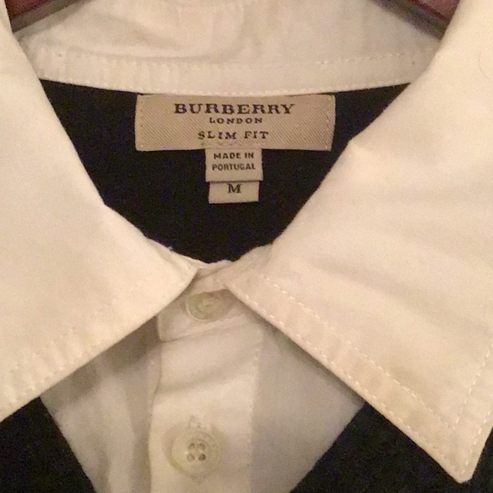 Authentic Burberry Mans sweater with attached collar .